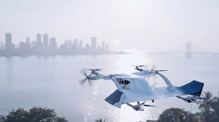 The e200X in flight over the Mumbai coastline